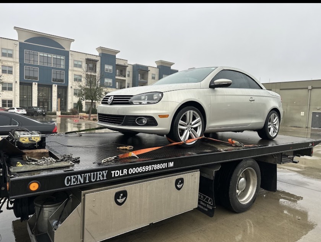 Volkswagen convertible secured on MJ Transport flatbed